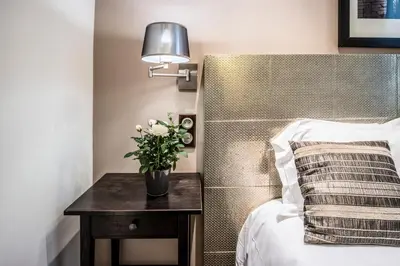 Un ou plusieurs lits dans un hébergement de l'établissement Hotel Chabrol Opera