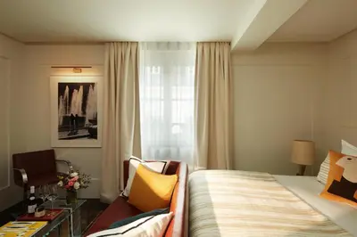 Un ou plusieurs lits dans un hébergement de l'établissement Hotel La Villa Saint Germain Des Prés