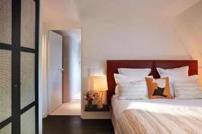 Un ou plusieurs lits dans un hébergement de l'établissement Hotel La Villa Saint Germain Des Prés