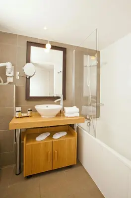 Salle de bains dans l'établissement Residhome Paris Opéra