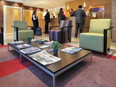 Coin salon dans l'établissement Residhome Paris Opéra