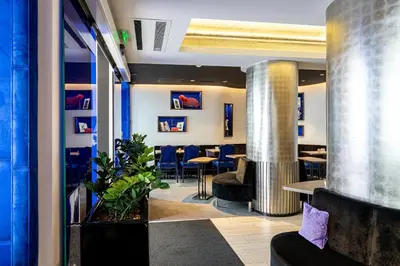Coin salon dans l'établissement Hôtel Diva Opera