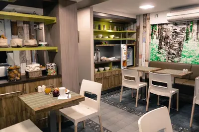 Restaurant ou autre lieu de restauration dans l'établissement Prince Albert Wagram