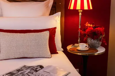 Un ou plusieurs lits dans un hébergement de l'établissement Hotel Trianon Rive Gauche