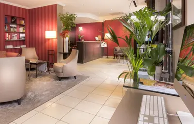 Coin salon dans l'établissement Europe Hotel Paris Eiffel