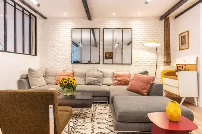 Coin salon dans l'établissement Design & New Loft - 8 guests - Heart of Paris