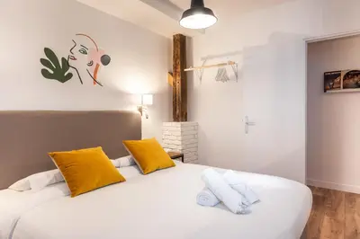 Un ou plusieurs lits dans un hébergement de l'établissement Design & New Loft - 8 guests - Heart of Paris
