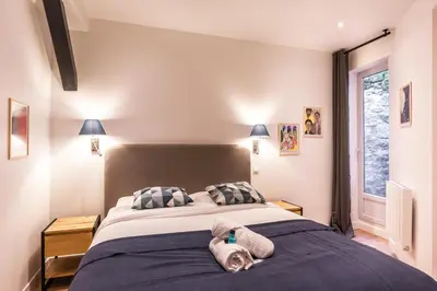 Un ou plusieurs lits dans un hébergement de l'établissement Design & New Loft - 8 guests - Heart of Paris