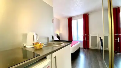 Cuisine ou kitchenette dans l'établissement Boulogne Résidence Hotel