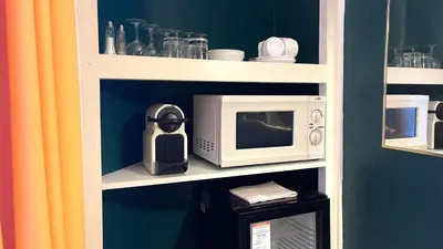 Cuisine ou kitchenette dans l'établissement Boulogne Résidence Hotel