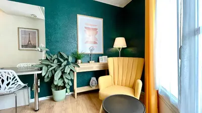 Coin salon dans l'établissement Boulogne Résidence Hotel