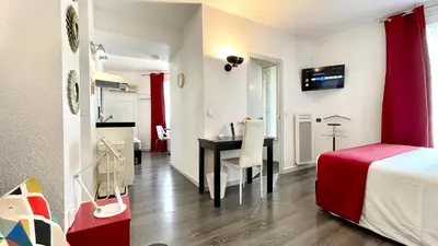 Un ou plusieurs lits dans un hébergement de l'établissement Boulogne Résidence Hotel