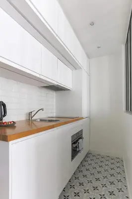 Cuisine ou kitchenette dans l'établissement Eiffel Tower Royal Apartment