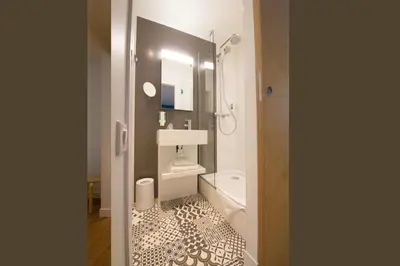 Salle de bains dans l'établissement La Regence