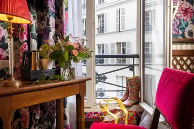 Coin salon dans l'établissement Hôtel Des Marronniers