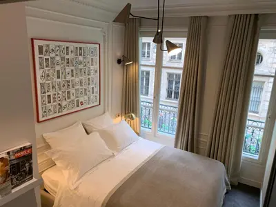 Un ou plusieurs lits dans un hébergement de l'établissement PARIS RIVOLI NOTRE DAME Chambre d'Hôtes Studio Private