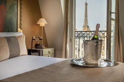 Un ou plusieurs lits dans un hébergement de l'établissement Hôtel Le Walt by Inwood Hotels