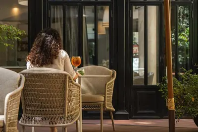 Coin salon dans l'établissement Hôtel Le Walt by Inwood Hotels