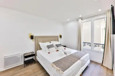 Un ou plusieurs lits dans un hébergement de l'établissement BASTILLE/LE MARAIS-LUXURIOUS 3 rooms flat