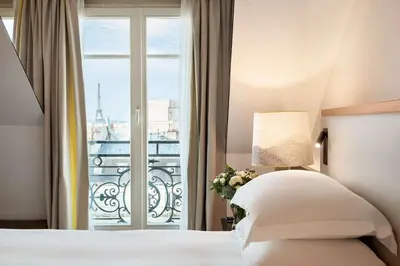 Un ou plusieurs lits dans un hébergement de l'établissement Hyatt Paris Madeleine