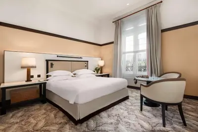 Un ou plusieurs lits dans un hébergement de l'établissement Hyatt Paris Madeleine