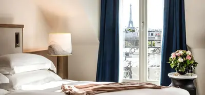 Un ou plusieurs lits dans un hébergement de l'établissement Hyatt Paris Madeleine
