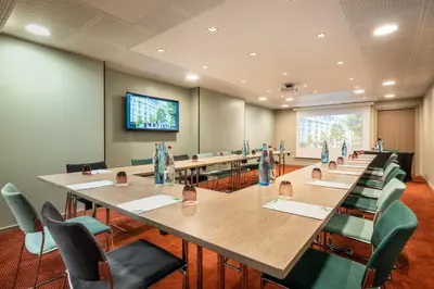 Télévision ou salle de divertissement dans l'établissement Holiday Inn Paris - Gare de Lyon Bastille by IHG