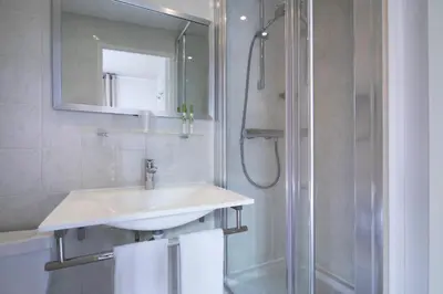 Salle de bains dans l'établissement Hôtel Soft