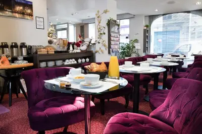 Coin salon dans l'établissement Hôtel Soft