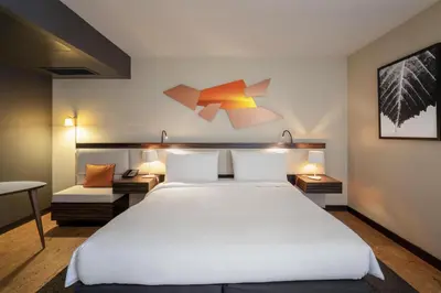 Un ou plusieurs lits dans un hébergement de l'établissement DoubleTree by Hilton Paris Boulogne