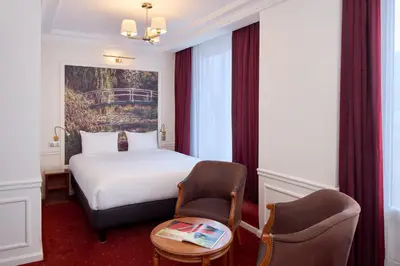 Un ou plusieurs lits dans un hébergement de l'établissement Timhotel Tour Montparnasse