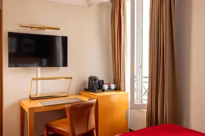 Télévision ou salle de divertissement dans l'établissement Royal Saint Michel
