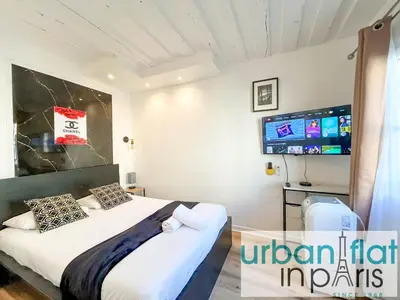 Un ou plusieurs lits dans un hébergement de l'établissement 100 - Luxury 2 Bedroom - Beaubourg Marais