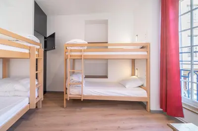 Un ou plusieurs lits dans un hébergement de l'établissement MIJE MARAIS Hostel