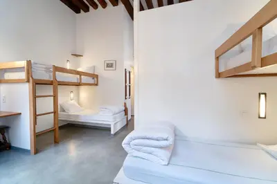 Un ou plusieurs lits dans un hébergement de l'établissement MIJE MARAIS Hostel