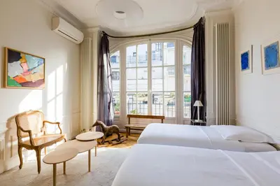 Un ou plusieurs lits dans un hébergement de l'établissement Veeve - Haussmann Beauty in the 6th