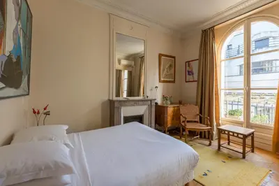 Un ou plusieurs lits dans un hébergement de l'établissement Veeve - Haussmann Beauty in the 6th