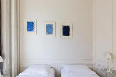 Un ou plusieurs lits dans un hébergement de l'établissement Veeve - Haussmann Beauty in the 6th