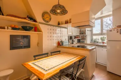 Cuisine ou kitchenette dans l'établissement Veeve - Haussmann Beauty in the 6th