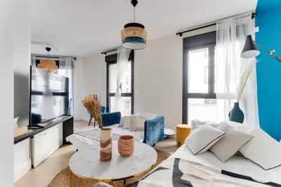 Coin salon dans l'établissement Palais des congrès , 4 bedrooms