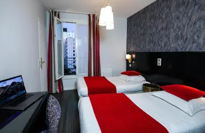 Un ou plusieurs lits dans un hébergement de l'établissement Eiffel Villa Garibaldi
