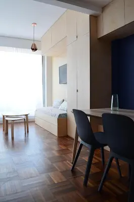 Un ou plusieurs lits dans un hébergement de l'établissement Appartement design avec balcon