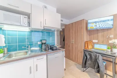 Cuisine ou kitchenette dans l'établissement Break & Home Paris Italie Porte de Choisy Appart'Hôtel