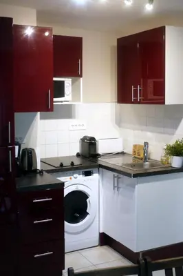 Cuisine ou kitchenette dans l'établissement Le Petit Chatelet appartement 3 au coeur de Paris