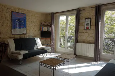 Coin salon dans l'établissement Le Petit Chatelet appartement 3 au coeur de Paris