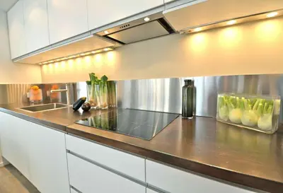 Cuisine ou kitchenette dans l'établissement Bourbons