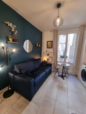 Coin salon dans l'établissement Cosy studio in heart of Montmartre