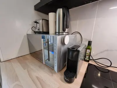 Cuisine ou kitchenette dans l'établissement Cosy studio in heart of Montmartre