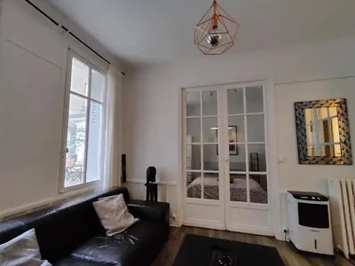 Coin salon dans l'établissement Nice and cozy 1b apartment in the heart of Paris