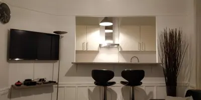 Télévision ou salle de divertissement dans l'établissement Nice and cozy 1b apartment in the heart of Paris